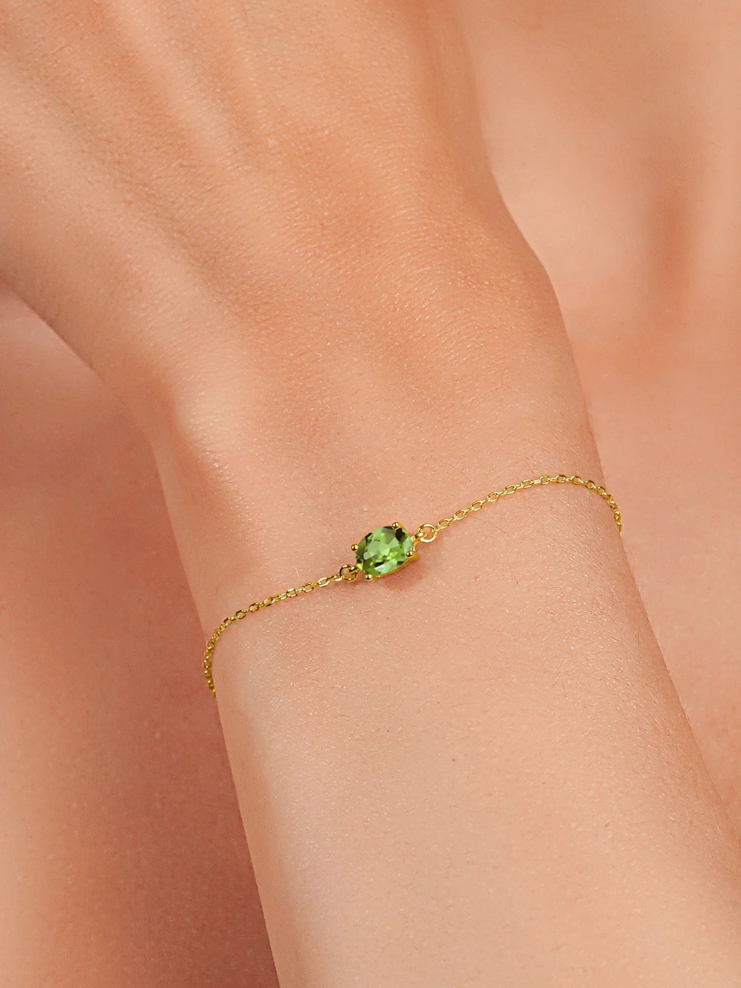 Gem Stone King 18K Yellow Gold Plated Silver Green Peridot Solitaire Bracelet For Women (0.90 Cttw, Oval Cut 7x5mm)